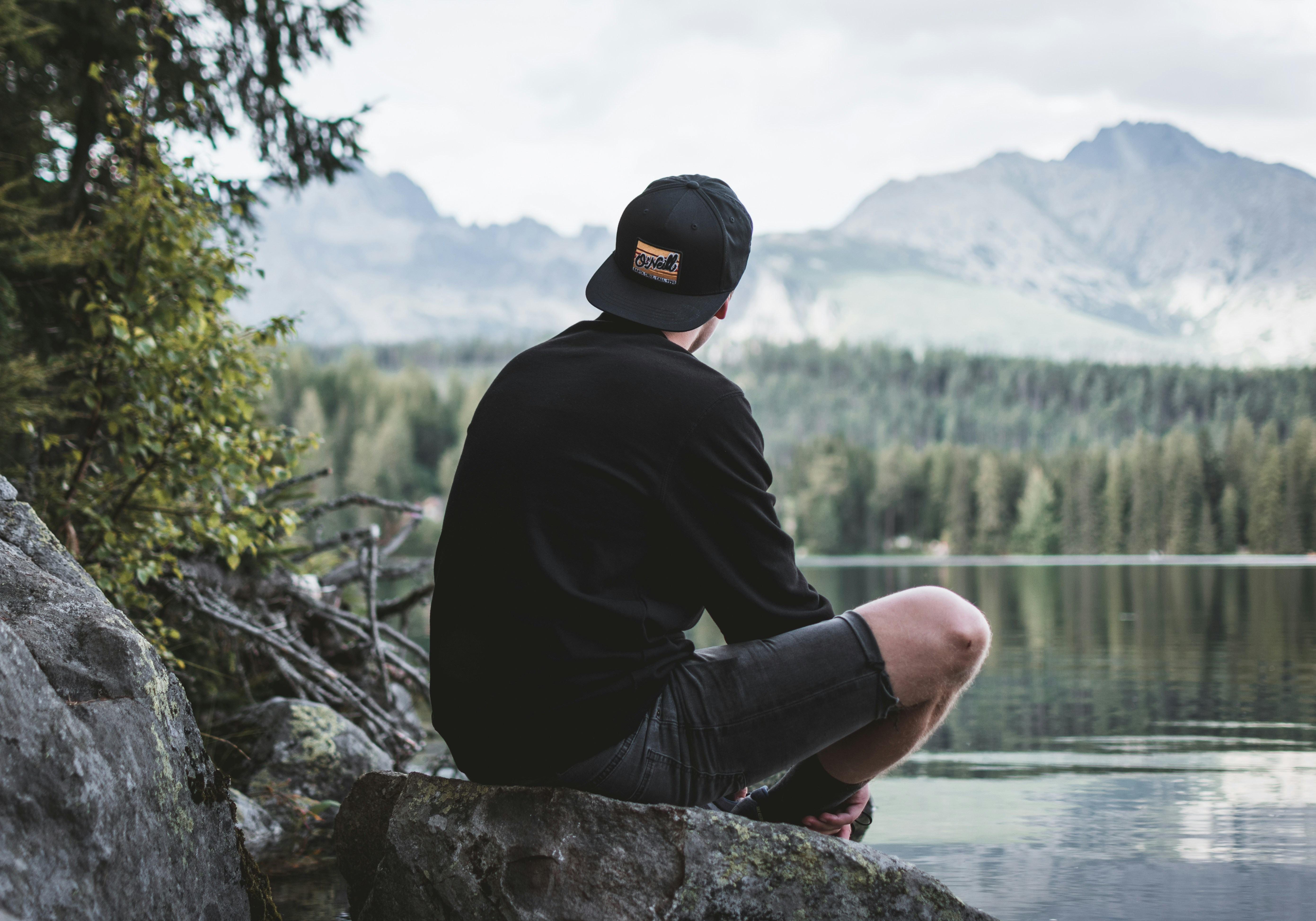 Person sitting quietly, representing depression